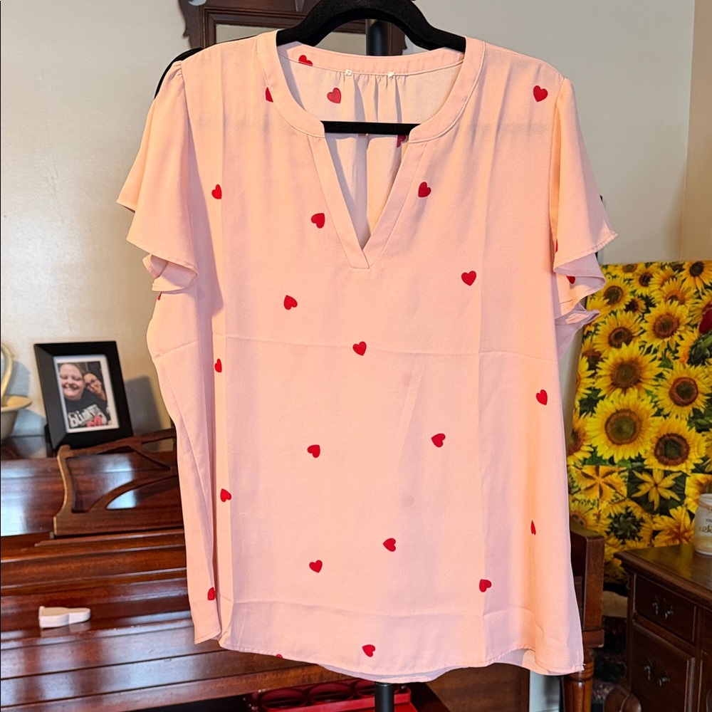 Elegant Pink Blouse with Red Heart Accents